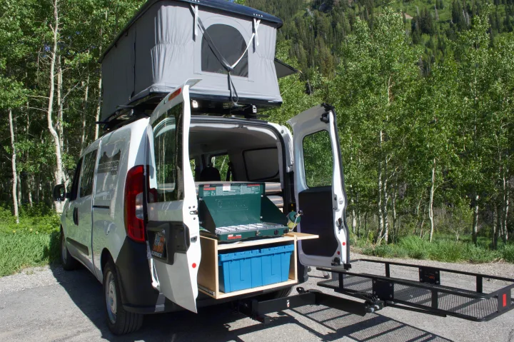 RV rental camper van with pop-top roof tent & pull-out outdoor kitchen by aspen trees, ready for adventure!. Ram Promaster City 2018