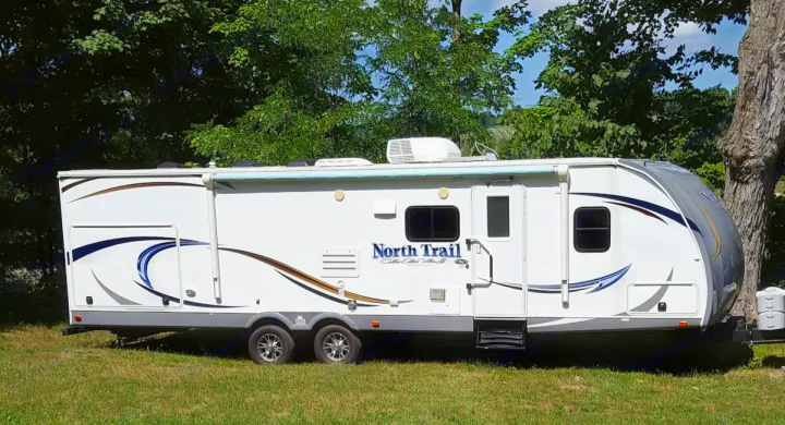Our beloved camper.  It is truly like a family member.  It's exceptionally clean and well maintained.  We take care of her.. Heartland North Trail 2014