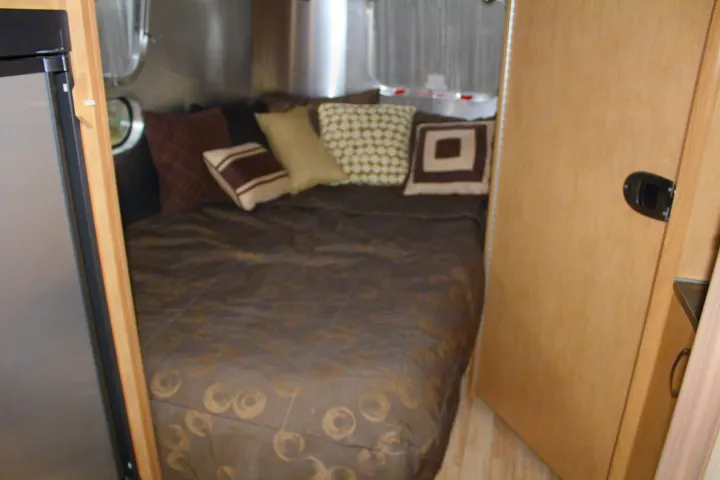 A comfy bed to gather on to watch tv. 