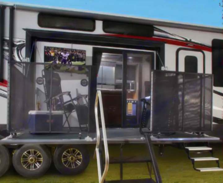 Side Patio with electronic awing and lights. Keystone Raptor 2016