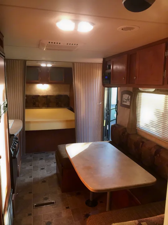 queen bed has privacy shutters . Northwood Mfg Nash 2015