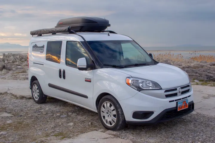 This Basecamper Vans RV rental, a white Ram ProMaster City, is ready for your next outdoor adventure by the lake.. ram promaster city 2018