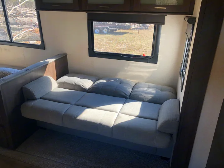 Sofa converted to bed. Forest River Wildwood 2018