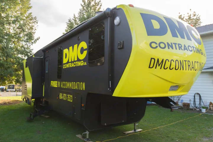 Black and neon yellow DMC Contracting RV rental provides mobile accommodation.. sprinter keystone 2018