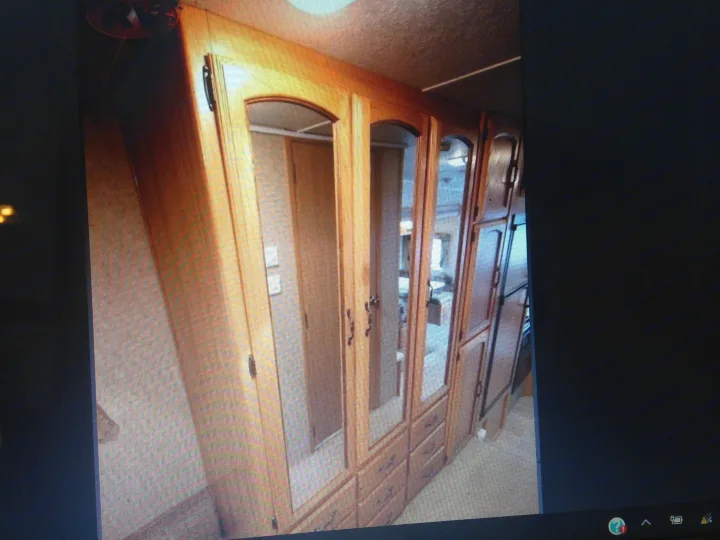 RV rental: Light wood cabinets with arched glass doors & drawers. Organized interior storage for your road trip comfort.. Palomino Puma 2010