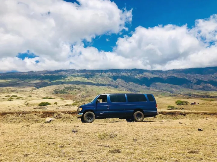 Royal Blue driving around all-island on Hana Highway. Ford Econolline 250 2002