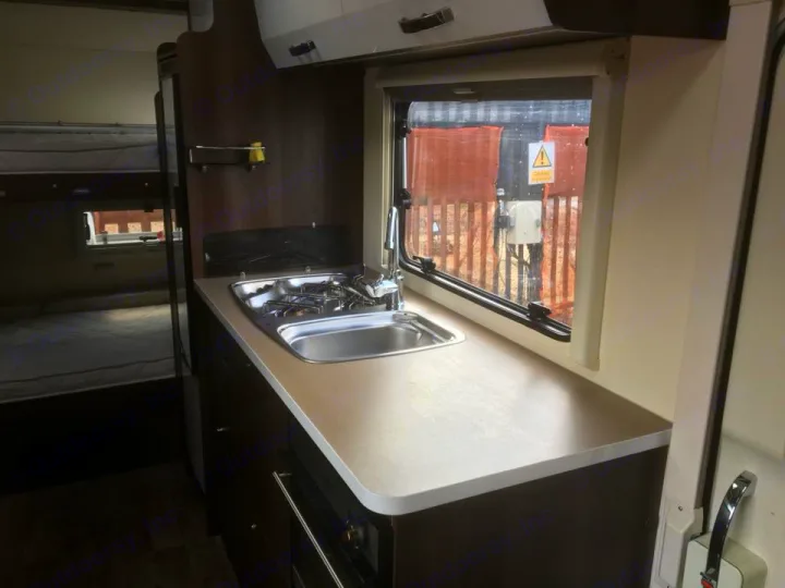 This RV rental offers a well-equipped kitchen with sink and stove, plus cozy bunk beds in the rear. Ideal for your next adventure.. Other Transit Motorhome 2018