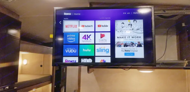 Roku TV Home screen with streaming apps (Netflix, Hulu, Prime Video) inside an RV rental for convenient entertainment.. Forest River Fr3 2021