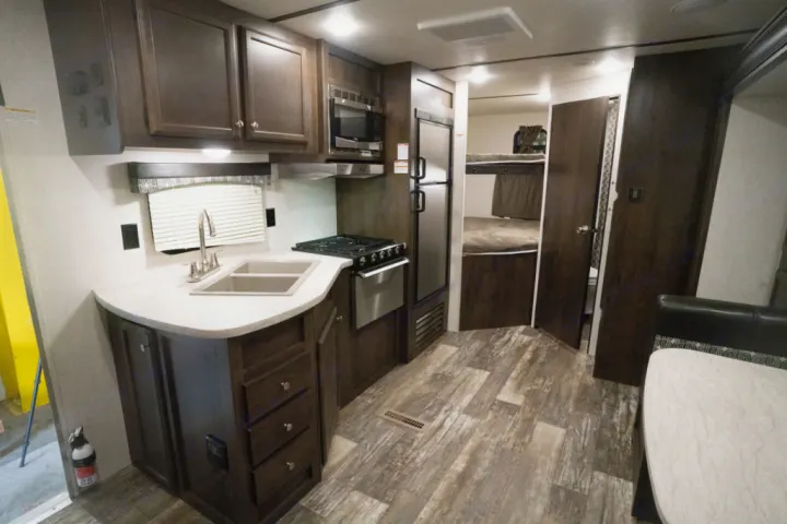 Spacious kitchen with good amount of counter and cabinet space.. Starcraft Avalon 2018
