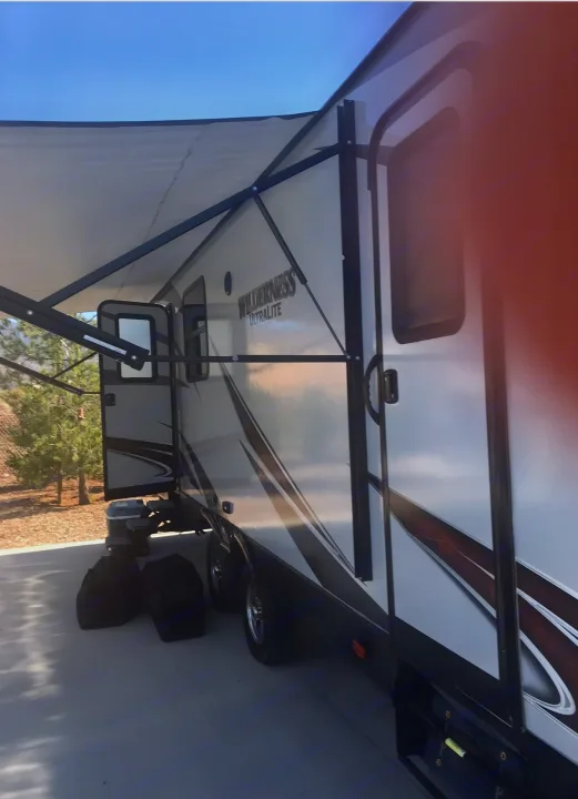 Exterior with electric awning out.. Heartland Wilderness 2017