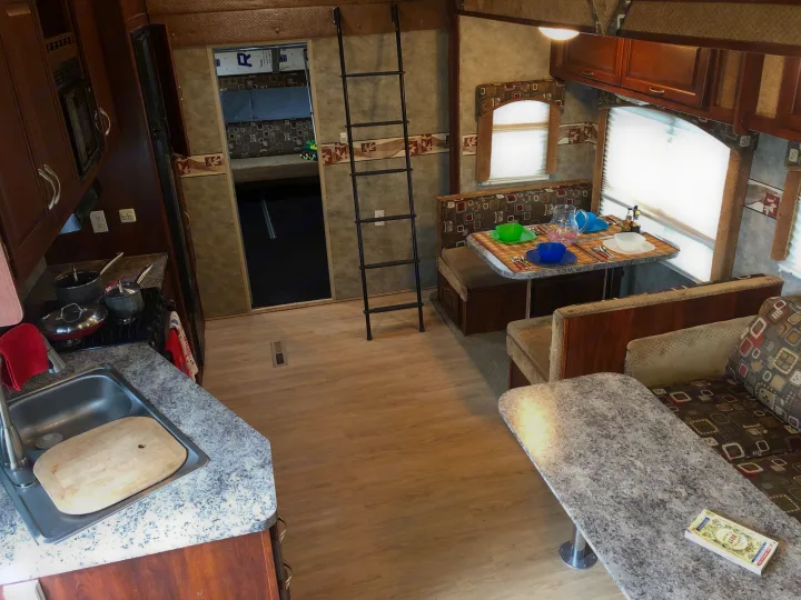 The spacious living area, full stocked with all the basics for a comforting and relaxing stay! . Thor Motor Coach Tahoe 2008