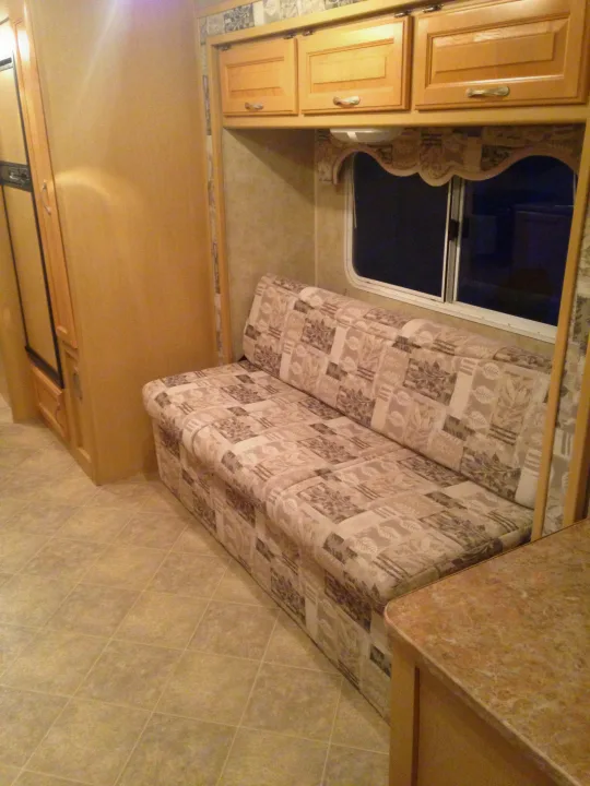 This couch is part of the slide and it folds into an additional bed.. Dutchmen Aerolite 2007