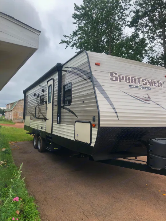 Side view, main door. K-Z Manufacturing Sportsmen 2019