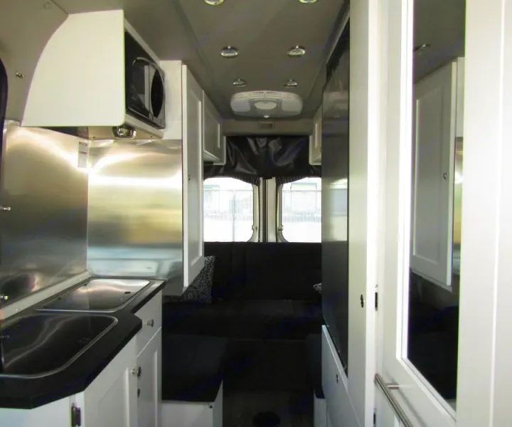 You'll have ample storage in the kitchen including a pull-out pantry and a deep pot drawer. . Roadtrek Zion SRT 2019