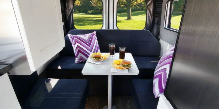 Rear dining area sits up to 5. Seats 3 while driving. (Source: Roadtrek). Roadtrek Zion SRT 2019