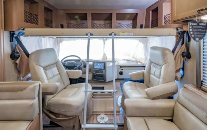 This is the bunk above the driver and passenger seats.  This goes up while driving.  Plenty of storage space.. Thor Motor Coach A.C.E 2017