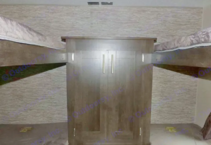 RV rental interior: cozy bunk beds flank a central wardrobe cabinet, perfect for compact sleeping arrangements.. K-Z Manufacturing sportsmen 301bhse 2020