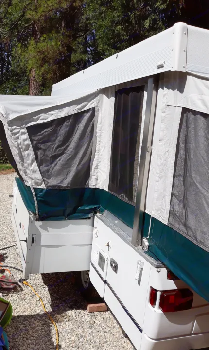 The pop out dining. . Coleman Other 2000