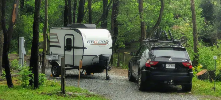 Great photo we took in 2018 trip through the states.  Shows a good example of it's size versus a 2.5L BMW X3 that we use to tow with ease.  2" ball is required for towing, and we highly recommend an eletric brake setup to the 7 pin wiring harness.. Forest River Other 2016