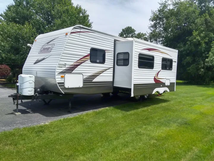 Large power Slide Out that includes the Living room Sleeper Sofa and the "U" Shaped Dinette Table that converts into an additional sleeping area as well.. Dutchmen Coleman 2010