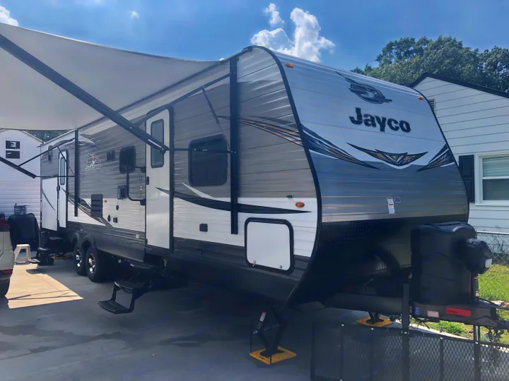Experience comfort with this Jayco travel trailer. Extended awning and spacious design. Ideal for your next rv rental.. Jayco Other 2020