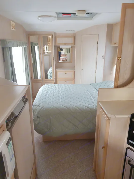 Interior  , has plenty of room to move around  and plenty of cupboard space . Roadstar vacationer 2000