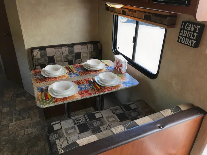 Dinette set with our "nice dishes". All pictures taken May 2019.. Salem Cruise Lite M-231RKXL 2013