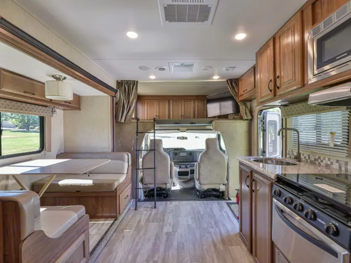 Has cab over bunk with storage space. Gulf Stream Conquest 2019