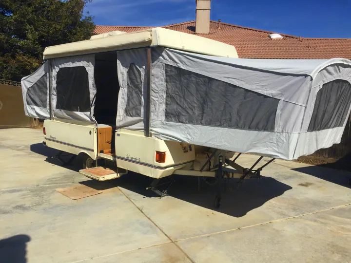 The door side of the tent trailer.. Coleman Grand Tour Shenandoah 1989