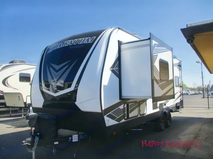 Beautiful exterior with queen bed slide-out extended.. Grand Design Momentum 21G w/ Patio and GEN 2019