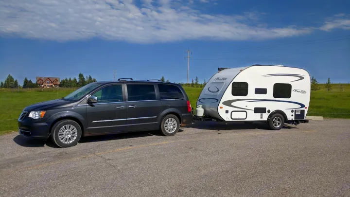 Top of the line Chrysler town and country limited edition with all leather heated seats, dual DVD, GPS.  Rent it to tow the Prolite RV in the picture for a great trip to the Rockies !. chrysler town and country 2012
