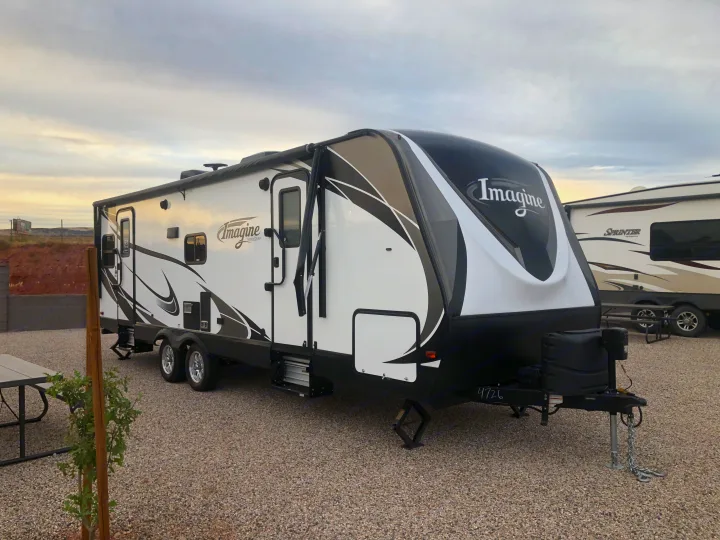 Great looking trailer but you can see the awning and what the weather did to the brace for it. Please be advised that the awning shall not be used until the repair is made. Storage space in front aswell. Grand Design imagine 2018