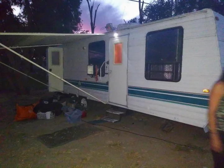 Pardon the clutter in the photo! We are moving out of it and are getting everything out. This is why I only posted a few photos! We prefer long term or 3 or more months. . Gulf Stream Cavalier 2000