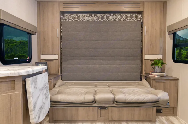 Explore this RV rental's versatile interior with a sofa converting to a comfy bed, integrated storage & scenic windows for travel.. Grand Design Imagine XLS 19BWE 2020