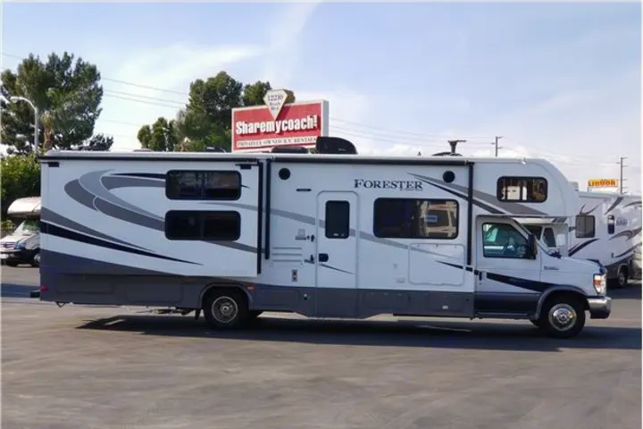This white & grey Forester RV is ready for adventure. Spotted at an rv rental lot, it features an extended slide-out.. Forest-River Forester 2017