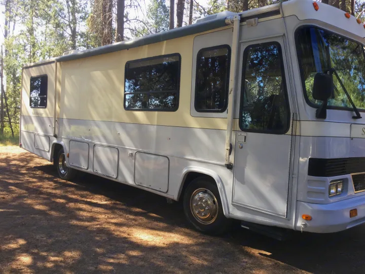 Classic old style motor home without any slide outs.  This is a diesel pusher, mated to a four speed automatic transmission.  It features slow acceleration and a top speed of about 60. The interior is clean and comfortable.. Gulf Stream Sun Voyager 1992