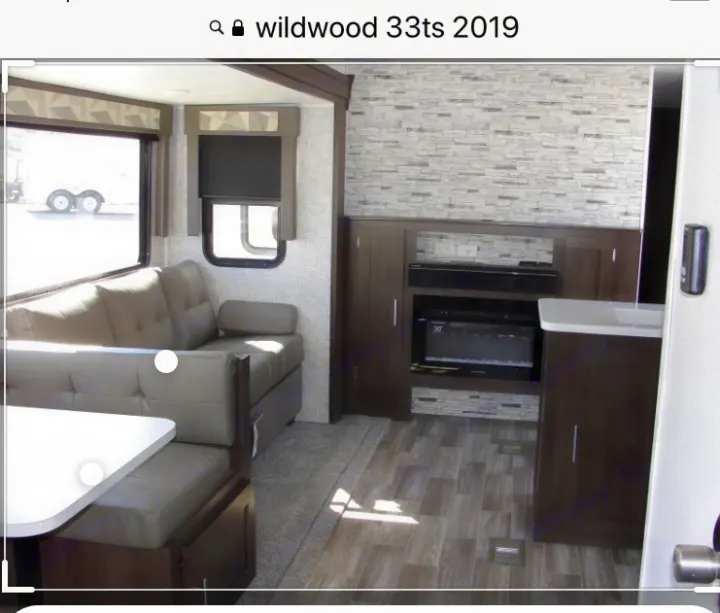 Family room with electric fireplace, and Bluetooth compatible sound bar speakers. . Wildwood 32qbss 33ts 2019
