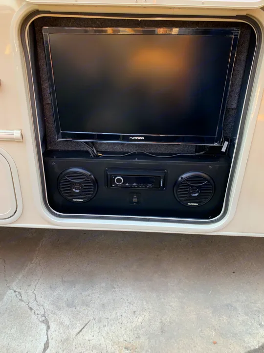 RV rental with outdoor entertainment: Furrion TV, stereo, and speakers for campsite fun.. Coachmen Freelander 2020