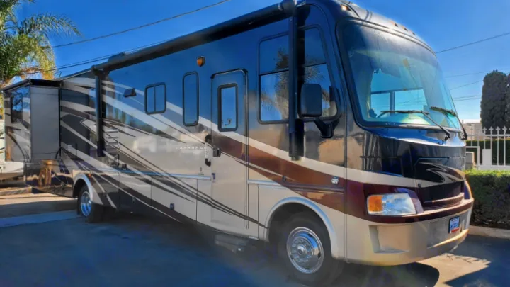 Spacious Class A motorhome, available for rv rental, parked outdoors with slide-outs extended, ready for adventures.. Thor Motor Coach Daybreak 2011