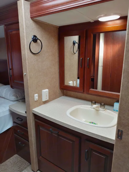 Sink and Medicine Cabinet. . Forest River Sunseeker 2014
