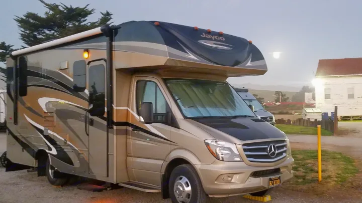 Stylish Jayco Class C RV rental, parked at dusk, offers luxury for your next road trip adventure.. Jayco Melbourne 2017