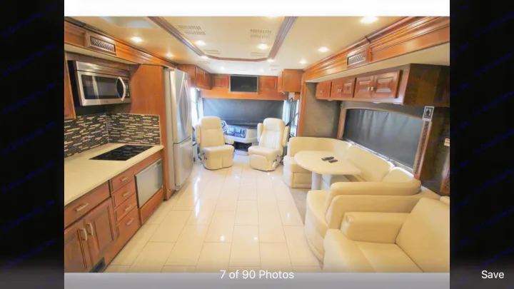 This spacious luxury RV rental interior features a full kitchen, dining area, and comfortable living space.. Holiday Rambler Endeavor 2018