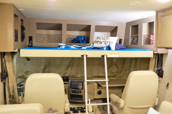 Overhead Bunk with lots of storage. Thor Motor Coach A.C.E 2020