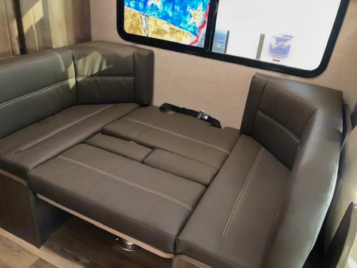 This RV rental's dinette converts to a comfy bed, offering extra sleeping space in its versatile interior.. Winnebago Minnie Winnie 2020