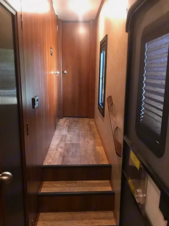 This picture shows the doors to the bunk house, bathroom and master.. Jayco Eagle 2018