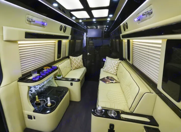 Experience comfort in this luxury RV rental, featuring cream leather seating and a premium bar.. Mercedes Entertainer 2020