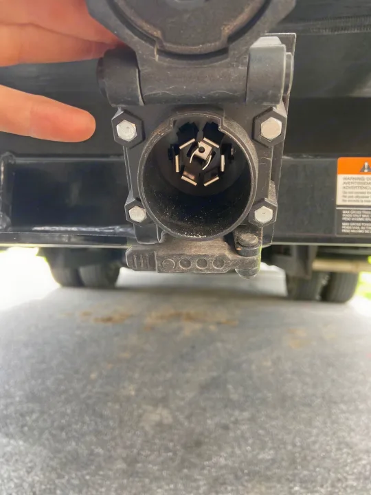 RV rental trailer's 7-way electrical connector, mounted at the rear for seamless wiring and power.. Thor Freedom Elite 2020