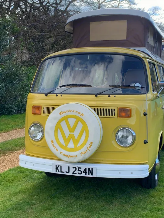 This charming yellow vintage VW camper van, named Buttercup by Retro Campers Norfolk, is available for rv rental trips.. Volkswagen 2.0L T2 Late Bay 1975