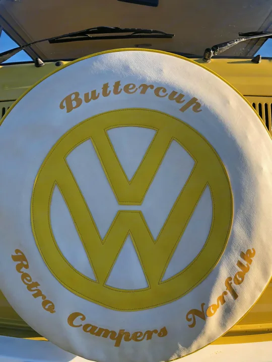 Custom VW camper spare tire cover, "Buttercup" from Retro Campers Norfolk, perfect for your next rv rental adventure!. Volkswagen 2.0L T2 Late Bay 1975