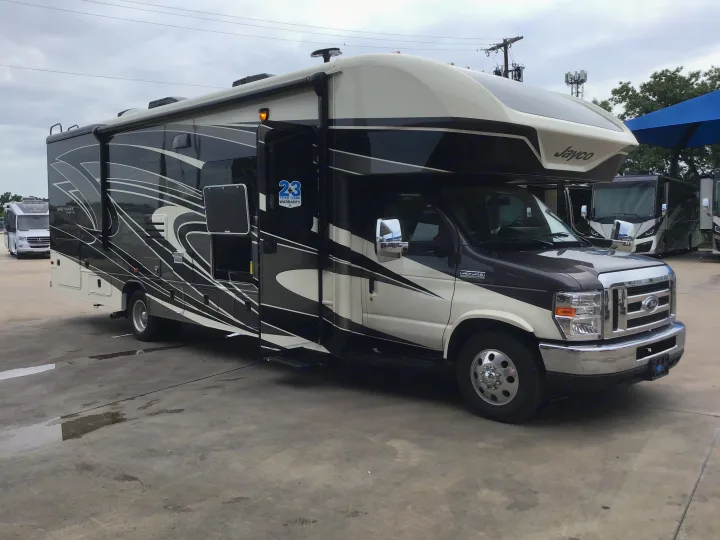 Jayco Greyhawk Prestige Class C RV on a Ford E-450 chassis, featuring striking black and cream design, ready for adventure or rv rental.. Jayco Greyhawk 2022